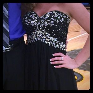 Full length homecoming or prom dress.