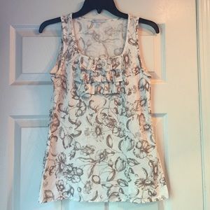 White and brown floral linen top.