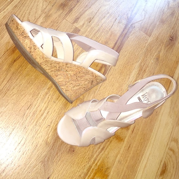 Like new, open toed wedges.