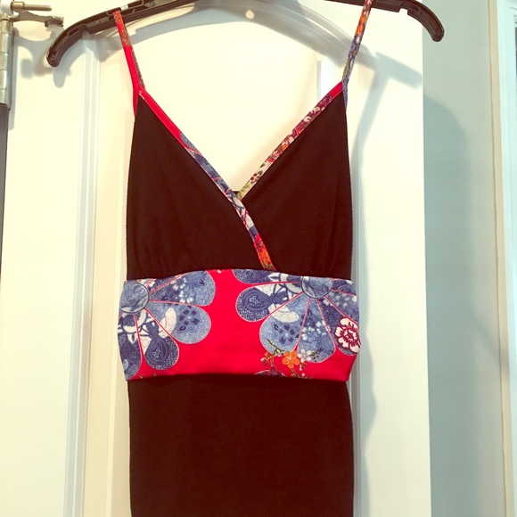 A colorful flowery and black tank