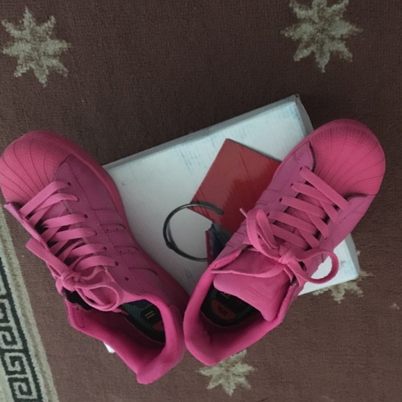 Like new hot pink Pharrell Adidas