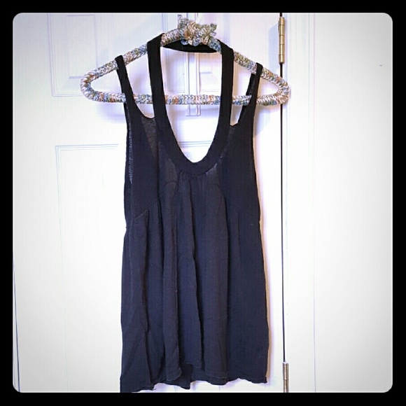 Free People black tank. Unique neckline! Size XS