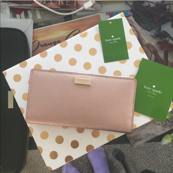 kate spade Handbags - New rose gold Kate spade wallet