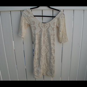 white quarter length sleeve body con dress