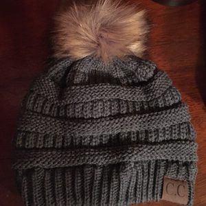 Beanie with faux fur topper. NWOT