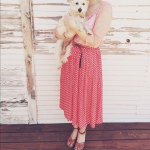 Long, light red and white polka dot skirt