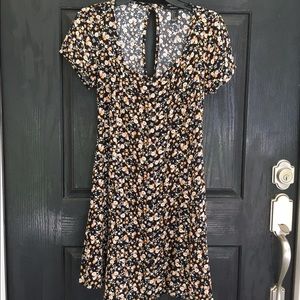 Adorable floral dress with open back details