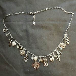 Multi charm necklace with angels, hearts and gems