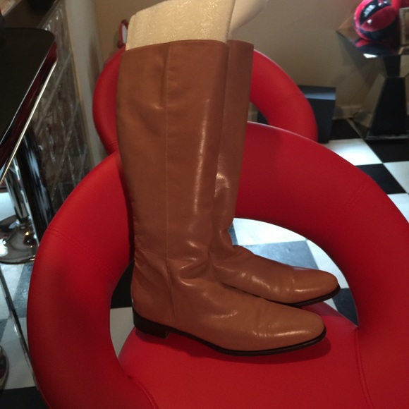 Knee high leather boots made in Italy.