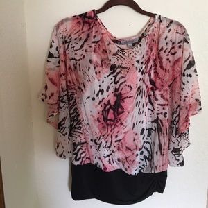 Jennifer Lopez  pink animal print blouse