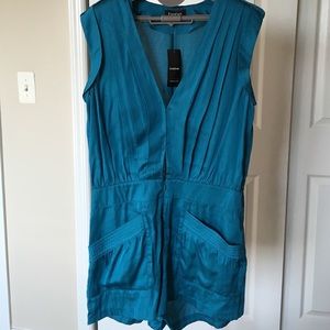 Teal silky romper. Never worn, still with tags!