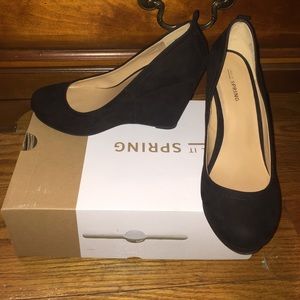 Call it spring black wedges!