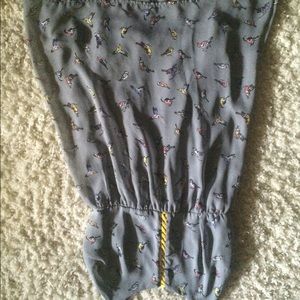 Is spaghetti strap dress with birds on it