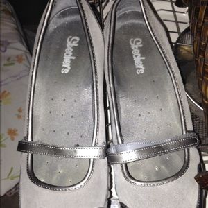 Silver Skecher Mary Janes.