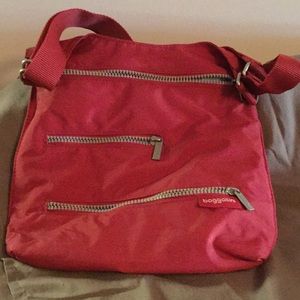 Red Baggallini Crossbody purse.