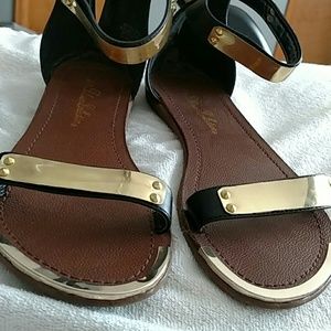 Black and gold sandals
