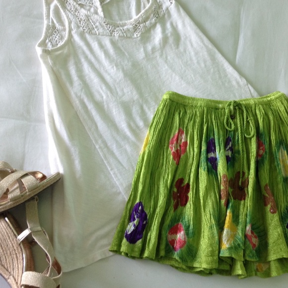 Green skirt with colorful flowers