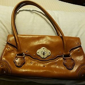 Michael Kors handbag.  Light brown.  Two straps.