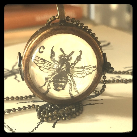 Steampunk brass tone spherical locket