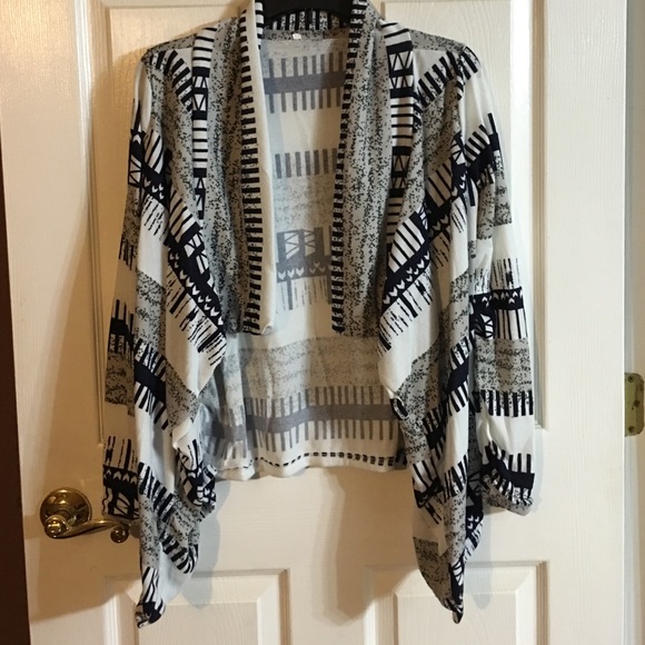 Cute little cardigan. Size small.