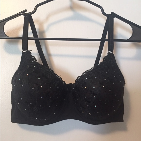 3 bras - black, purple, and cream/light pink