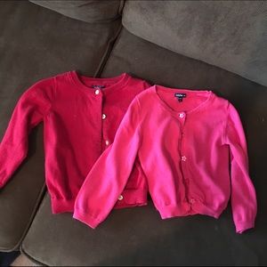 Two Baby Gap cardigans