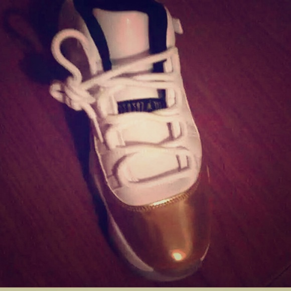 Jordan 11's metallic gold and white