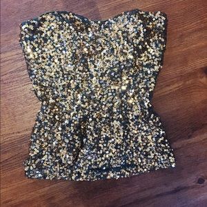 gold sequin strapless top.