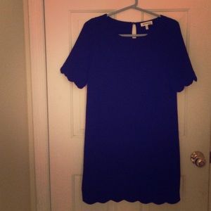 Francesca's scalloped hem and sleeve black dress