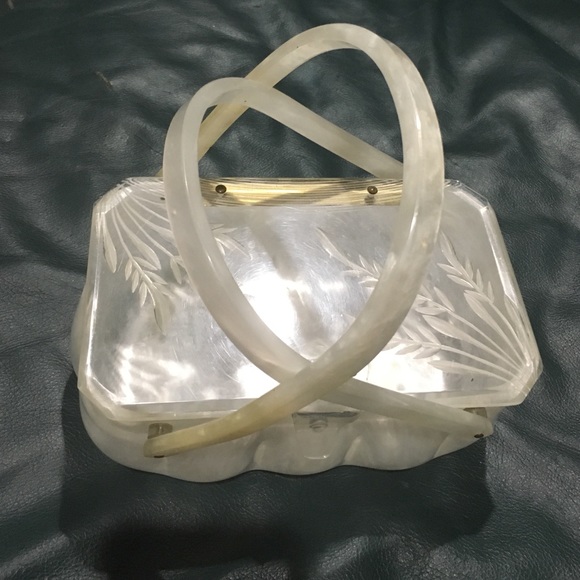 Bakelite white purse with etchings