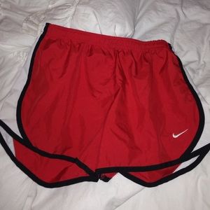 red and black nike running shorts