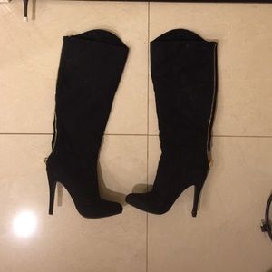 Black tall heel boots
