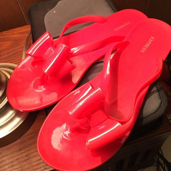 Express jelly flip flops pink bow US Size 9