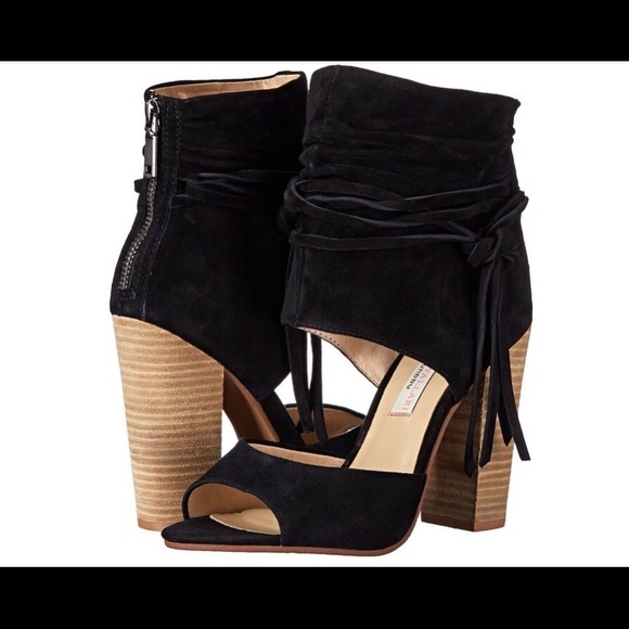 Designer shoes worn one time for two hours.