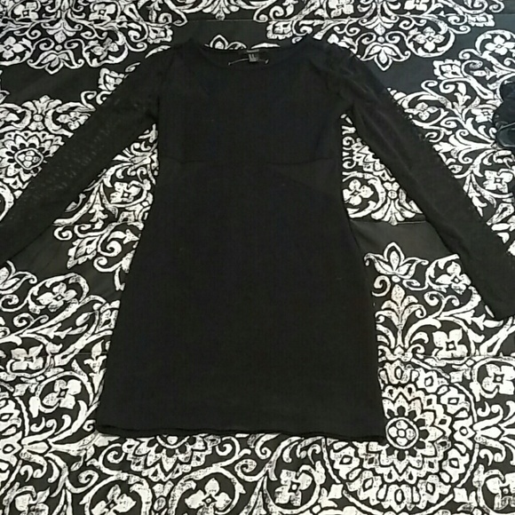 Never worn Forever 21 black mini dress.