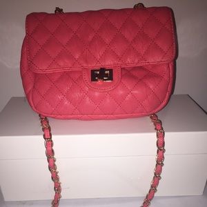Pink hand bag with gold braided strap