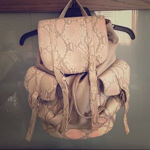 Grey vegan snake skin Top Shop backpack
