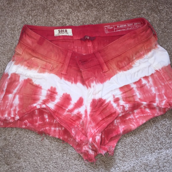 Red and white tie dye jean shorts