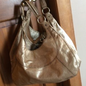 $10 gold hob Antonio Melani