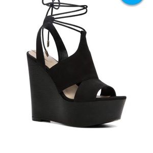 Lace up wedges. Brand new, never worn.