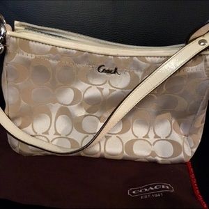 Signature Coach Mini Bag w/ blue satin lining