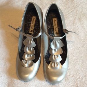 Silver ruffle shoes