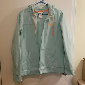 Light teal North Face jacket