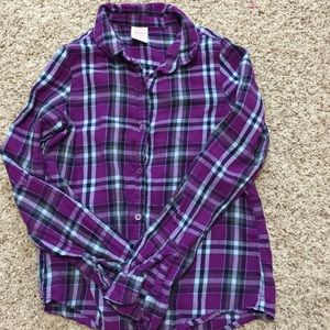Long sleeved, purple button down shirt