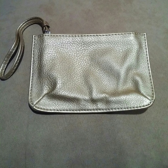 Charming Charlie Handbags - Charming Charlie Metalic Gold Wristlet Coin Purse