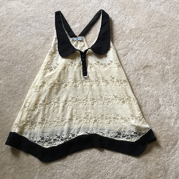 Cream and black boutique swing top.