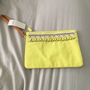 Bright yellow LOFT wristlet