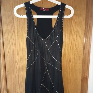 Black dress with studs.