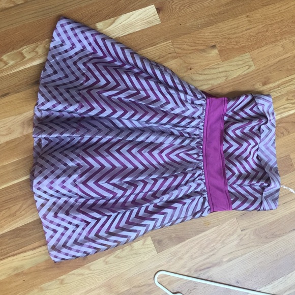 A purple and sliver formal dress
