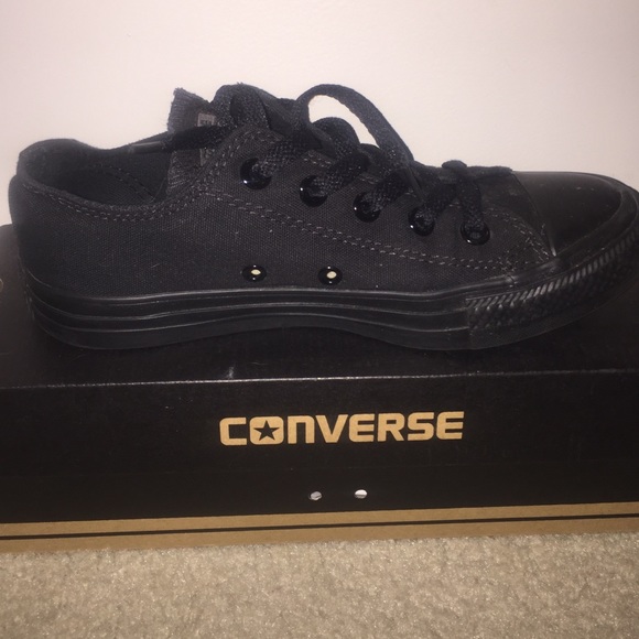 All black low top Converse